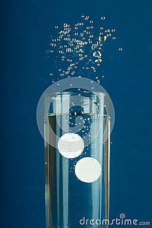 Tablets in water Stock Photo