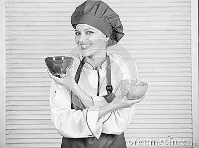 Tableware choice. culinary cuisine. cook in restaurant, uniform. professional chef cooking in kitchen. girl in apron and Stock Photo