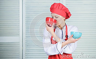 Tableware choice. culinary cuisine. girl in apron and hat hold bowls. cook in restaurant, uniform. professional chef Stock Photo