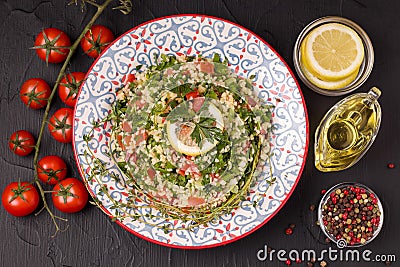 Tabule - oriental salad, next to the ingredients Stock Photo