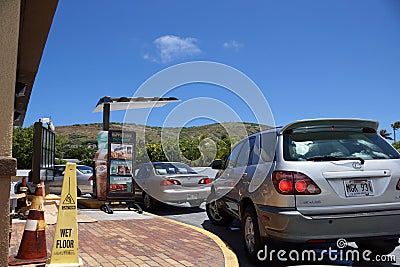 Taco Bell drive thru line of cars wait to order food Editorial Stock Photo