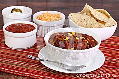 Taco Soup with assorted condiments Stock Photo