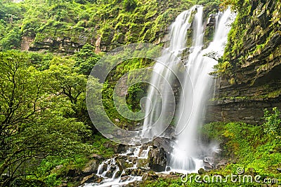 Tad TaKet waterfall, A big waterfall in deep forest at Bolaven plateau, Ban Nung Lung, Pakse, Laos Stock Photo