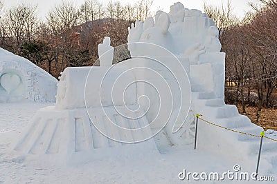Ice sculpture of mouse riding train Editorial Stock Photo