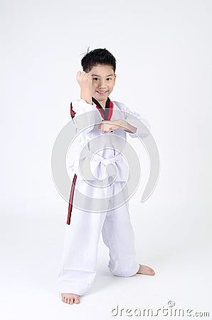 Taekwondo action by a asian cute boy Stock Photo