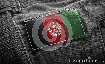 Tag on dark clothing in the form of the flag of the Afghanistan Stock Photo