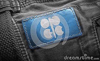 Tag on dark clothing in the form of the flag of the Organization of the Petroleum Exporting Countries Editorial Stock Photo