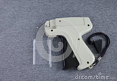 Tagging gun of cloth Stock Photo