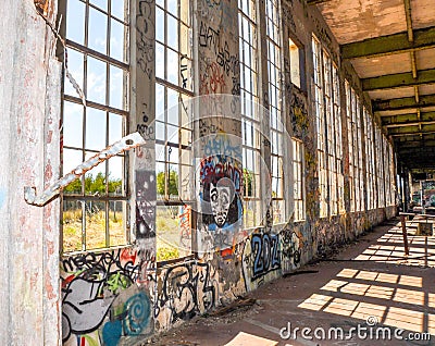 Tagging in the Shadows: Old Power House Editorial Stock Photo