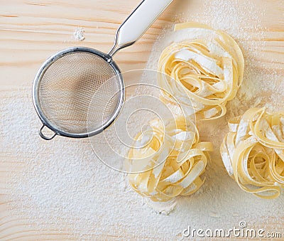 Tagliatelle pasta home made with flour and eggs Stock Photo