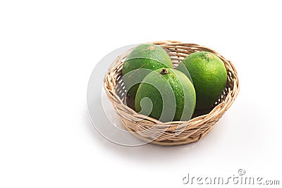 Tahiti Lemon into a basket. Stock Photo