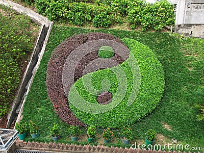Tai Chi Symbol in garden, wong tai sin temple Stock Photo