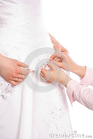 Tailor sew dress of bride Stock Photo