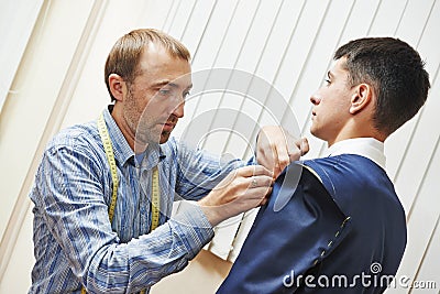 Tailor suit fitting Stock Photo