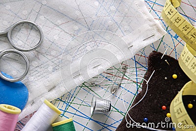 Tailoring tools on clothing pattern top view Stock Photo