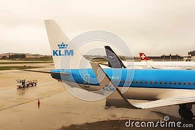 Tails of passenger planes on the tarmac Editorial Stock Photo