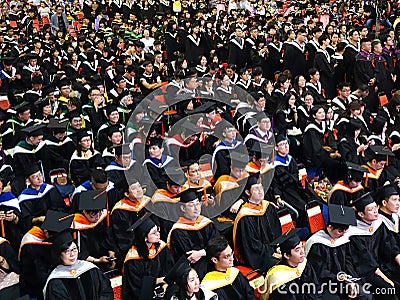Graduates Listen to a Speech Editorial Stock Photo