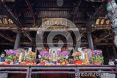 Daytime shot of many people visiting Lungshan Temple Editorial Stock Photo