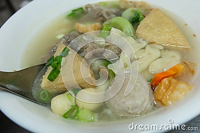 Taiwan instant noodle with sausage, tofu, yuba and vegetables.Taiwanese steet food Stock Photo