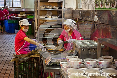 Taiwan, Taipei, Dragon Boat Festival, South Gate Market, making meat dumplings Editorial Stock Photo