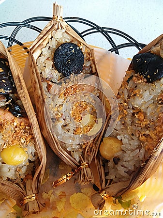 Taiwan& x27; Food : Sticky rice with meat and vegetable in bamboo boat Stock Photo