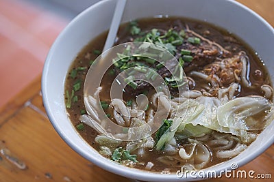 Taiwanese food of soup noodles with pork ribs cakes at restaurant Stock Photo