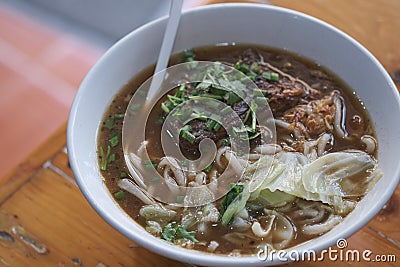 Taiwanese food of soup noodles with pork ribs cakes at restaurant Stock Photo