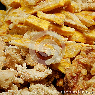 Taiwanese fried crispy sweet potato fries and deep fried popcorn chicken Stock Photo
