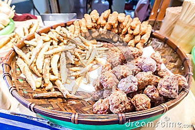 Taiwanese fried crispy sweet potato fries and deep fried popcorn chicken Stock Photo