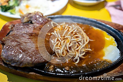 Taiwanese style beef steak and spaghetti Stock Photo