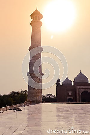 Taj Mahal, Agra, January 2019: One of the four pillars minarets of Taj Mahal a perfectly symmetrical building around main dome Editorial Stock Photo