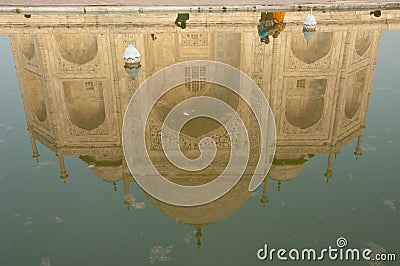 The Taj Mahal main building reflected in a water tank. Editorial Stock Photo