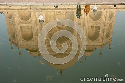 The Taj Mahal main building reflected in a water tank. Editorial Stock Photo