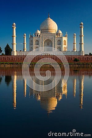 Taj Mahal reflected in river Stock Photo
