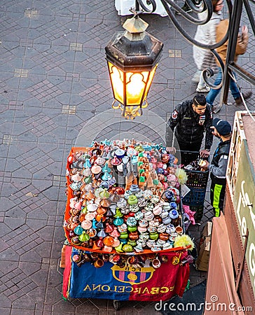 tajine seller in Djemaa El Fna square, Marrakech Editorial Stock Photo