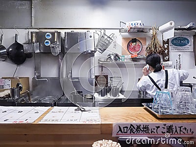 Takayama, Japan - April 15, 2018 : Japanese Ramen chef turn back Editorial Stock Photo