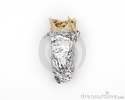 Bitten Durum kebab in foil paper Stock Photo