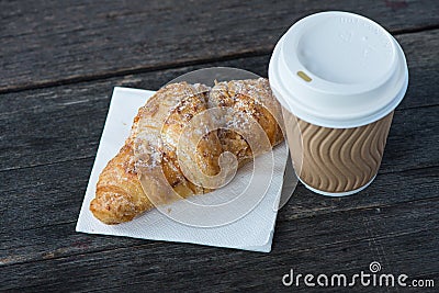 Take away coffee and fresh croissant Stock Photo