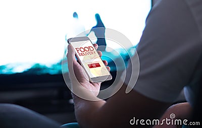 Take away food order online with delivery app and smartphone. Stock Photo