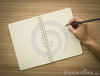 Take notes in a notebook Stock Photo