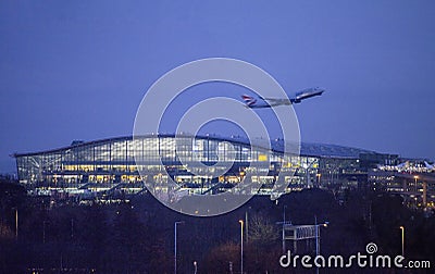 Take off at night from Heathrow airport Editorial Stock Photo