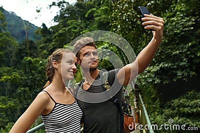 Take Photos. Couple Of Tourist Making Selfie On Vacation. Travel Stock Photo