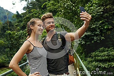 Take Photos. Couple Of Tourist Making Selfie On Vacation. Travel Stock Photo