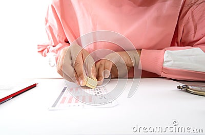 Take rubber in hand to revise the college entrance examination answer card Stock Photo