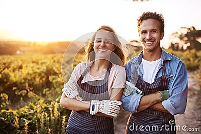 We take seeds and make something beautiful,valuable and essential. Portrait of a confident young man and woman working Stock Photo