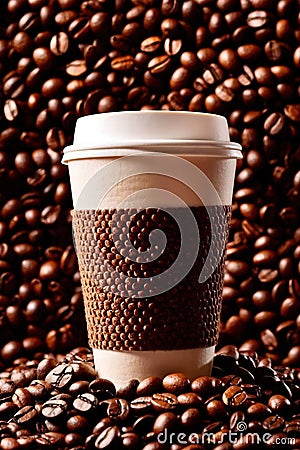 Takeaway paper cup of coffee with coffee beans Stock Photo