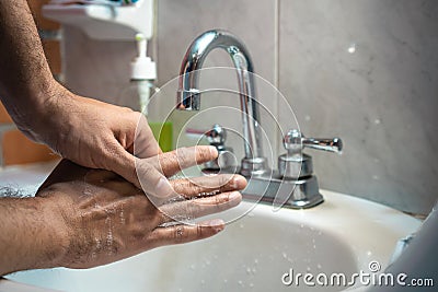 Taking the correct handwash in the sink v2 Stock Photo