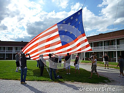 Taking Down the Flag Editorial Stock Photo