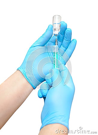 Taking drugs or vaccines into a syringe Stock Photo