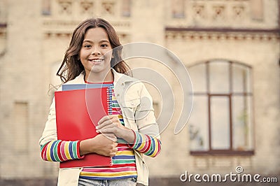 Taking extra course for deeper learning. School education. Choice course. Modern education. Kid smiling girl school Stock Photo